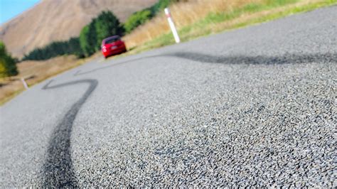 skids in front of car